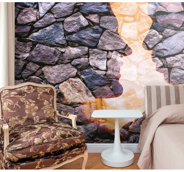 Abstract wall mural of silhouetted stone faces - TenStickers