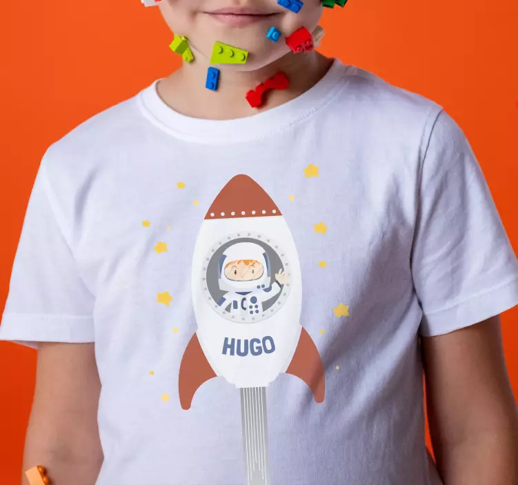 Astronaut with rocket Kids t-shirt - TenStickers